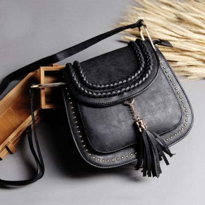 Braided Saddle Handbag With Tassel And Metallic..